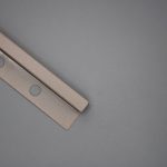 Nivel 12x12mm Acero Arena Marfil